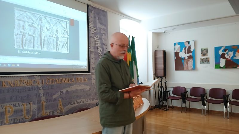 Doslovno i imaginativno čitanje jedne...